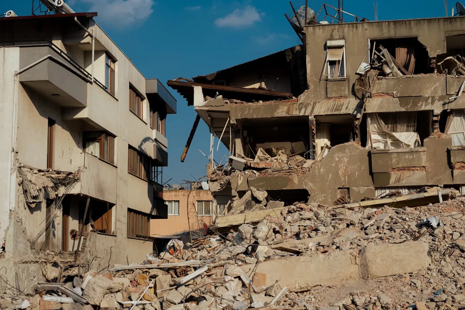 Gaza building collapse kills at least 20, dozens missing